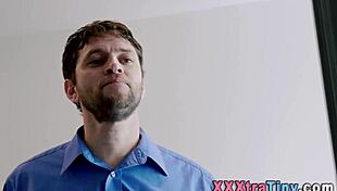 Teenager intensely strokes hard cock in close up