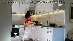 Hottest Redhead Tattooed Cheerleader Shows See-Through Panties in Kitchen