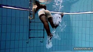 i admire petra, the hot hungarian teen, in the pool.