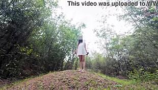 Thai Girl Helps Herself in Forest Outdoor Public