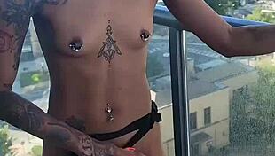 Kashofficials is getting strapped by Renity Love on the balcony. So hot!