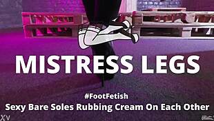 look at these sexy bare soles rubbing cream on each other in close up