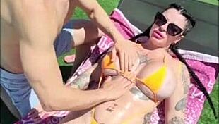 I spend time with my neighbor in the pool and playing foosball