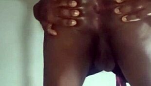 she fingers and spreads her open anus in sheer view