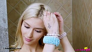 Picture-perfect blonde enjoys a refreshing shower