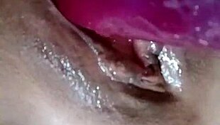 Juices of pleasure flow in lesbian squirting session