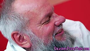 This teen is sucking an old man's cock