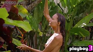 Beautiful blonde milf model Katya Clover shows perfect body while posing on the rain.