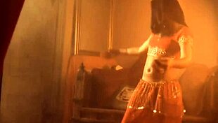 Exotic brunette lets her true feelings show in sensual striptease