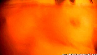 Exotic brunette lets her true feelings show in sensual striptease