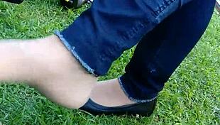 Check out this shoeplay with tan nylons and flats dipping.