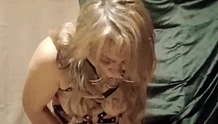 slave self-bondage with harness and magic wand