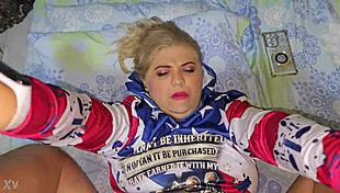 A golden blonde porn slut performing