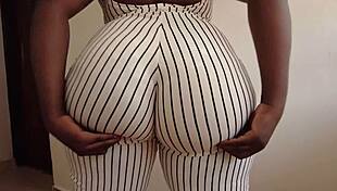 Ebony wife rides big black cock, pounding her apple bottom big ass in cowgirl for creampie.