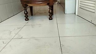 guy of big dick takes armchair to bathroom and masturbates