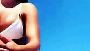 Enjoying hot vacations while showcasing big boobs and sexy body