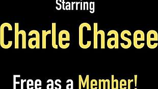 Charlee Chase rubs her clit hard with toy in cunt