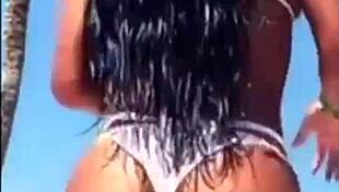 Enjoying hot vacations while showcasing big boobs and sexy body