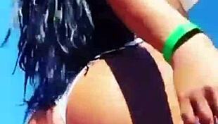 Enjoying hot vacations while showcasing big boobs and sexy body