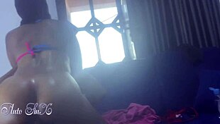 Having passionate sex with the house maid in the bedroom.