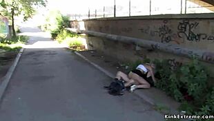 Blonde woman bound in latex explores public exhibitionism