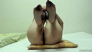 japanese girl airi exercises in fishnet stockings and micro thong