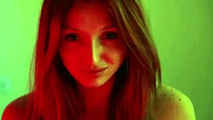 pretty redhead whipping her own ass until she cums