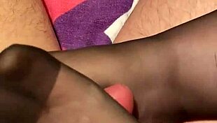 Giving Hubby Footjob in Black Reinforced Toe Stockings