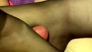 Giving Hubby Footjob in Black Reinforced Toe Stockings