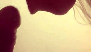 Detailed scene of a couple engaging in intense cock sucking