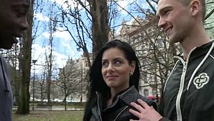 Dark haired babe in red lace enjoys a big black monster cock as her man licks her pussy