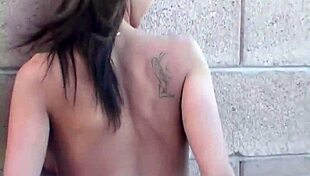 Petite brunette Mandy teases in bikini striptease, ripping clothes for camera