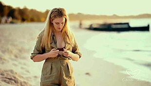 Charlie Forde and Olive Gee making out passionately at the beach sunset 😍