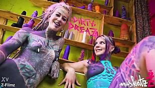 Two Tattooed Lesbians Engage in Play with Large Toys, Achieving Genuine Peaks