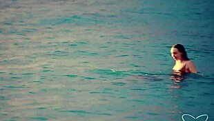 Charlie Forde and Olive Gee making out passionately at the beach sunset 😍