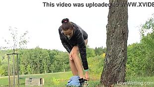 Susie heads outdoors for her solo pissing scene