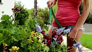 busty housewife seduces young gardener girl outdoors