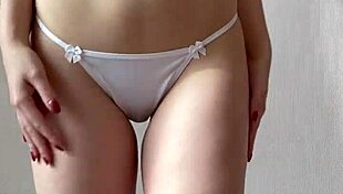 innocent redhead girl strips for you in stockings and panties