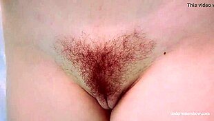 redhead marketa in a white dress in the pool