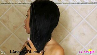 Elegant brunette model freshens up in the bathroom before her casting interview and photoshoot session