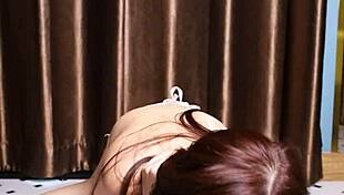 April Maxima Sucking a Dildo Before Footjob