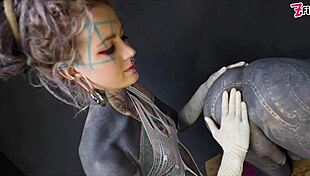 Tranny gets anal stretched by tattooed dominatrix in ass fisting