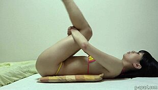 japanese girl in micro bikini flaunts her boobs