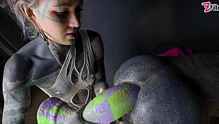 Tranny gets anal stretched by tattooed dominatrix in ass fisting