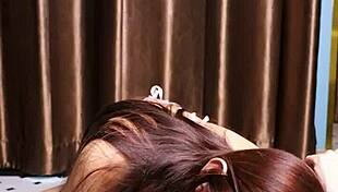 April Maxima Sucking a Dildo Before Footjob