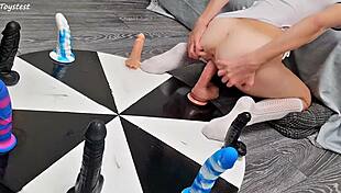 The petite stepsister spins the wheel of dildos and achieves her orgasm