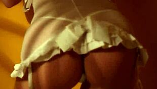 Retro tease or solo play? This sexy blonde chooses both