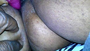 Sexy ebony BBW plays with her hairy pussy using a vibrator in solo action!