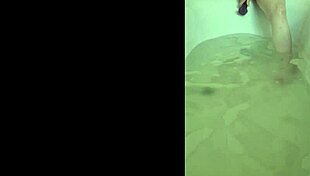 she's in the bath, getting all horny and reaching that solo orgasm.