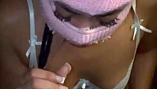 Masked beauty performs deepthroat on big black cock